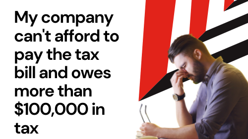 businessman stressed with glass off holding eyes closed concerned about business tax debt he owes to ATO
