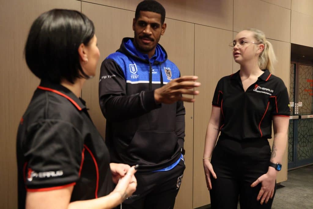 Fiji Bati Players Talking to Pherrus Financial Services Staff 2