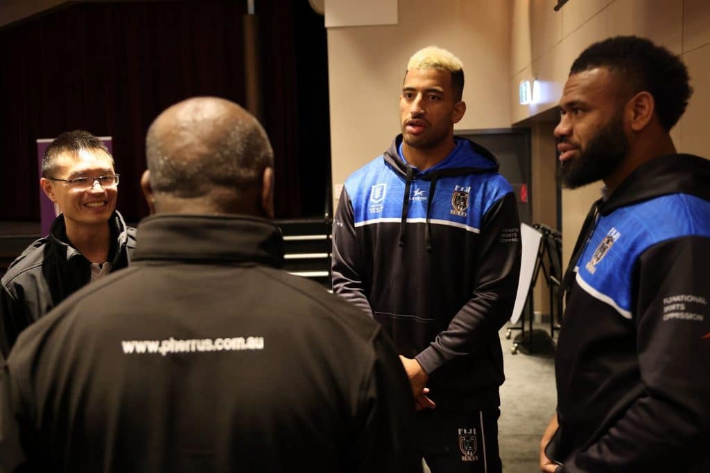 Fiji Bati Players Talking to Pherrus Financial Services Staff 1